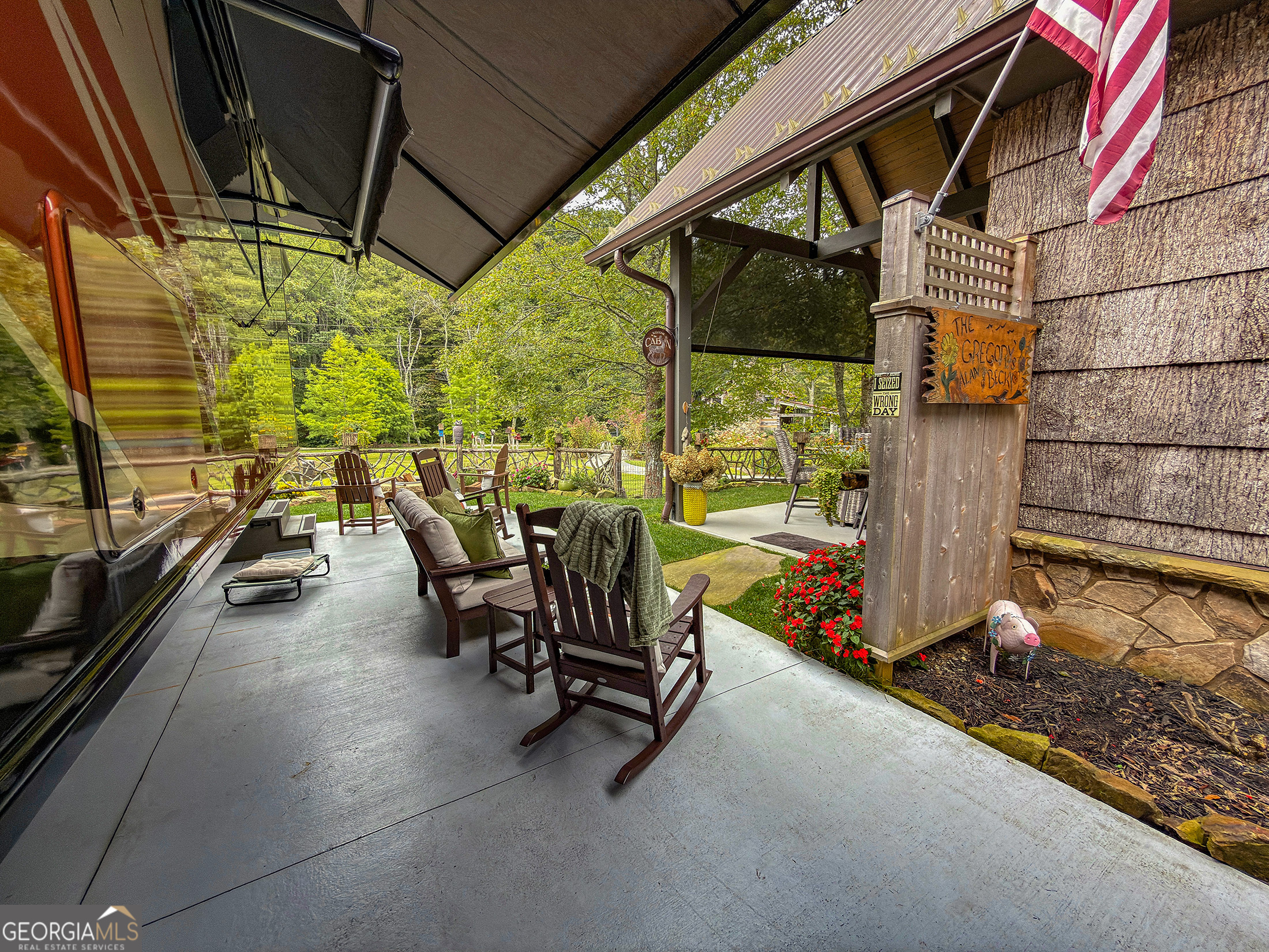 111 Wildflower Road Scaly Mountain, NC 28775 - Photo 13 of 52 a view of a chairs and table in the balcony
