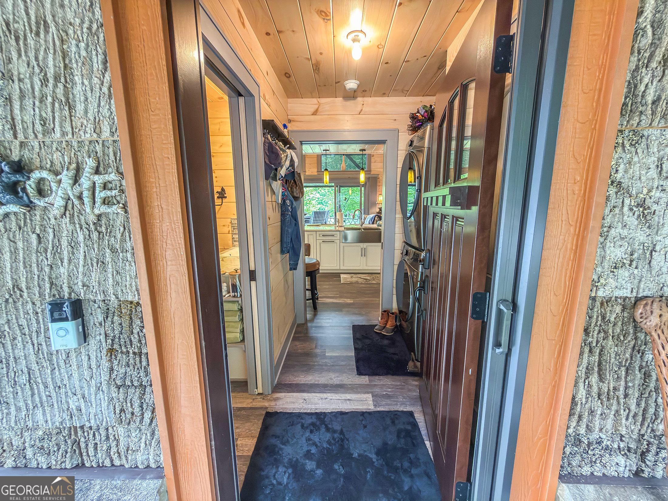 111 Wildflower Road Scaly Mountain, NC 28775 - Photo 18 of 52 a view of a hallway with wooden floor and staircase