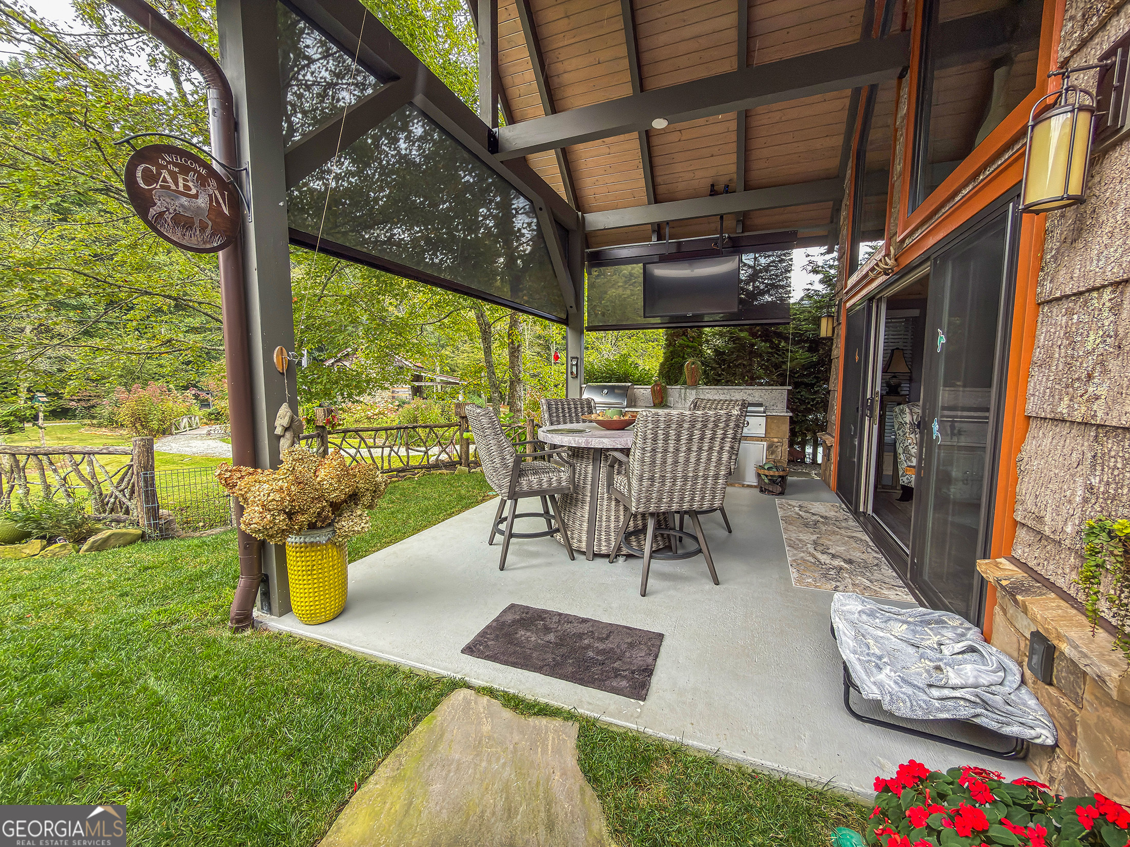 111 Wildflower Road Scaly Mountain, NC 28775 - Photo 2 of 52 a view of outdoor space yard and patio