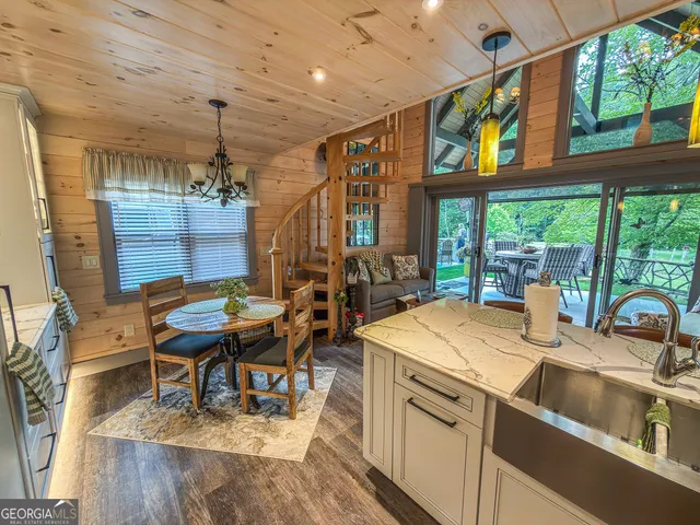 a room with furniture and wooden floor
