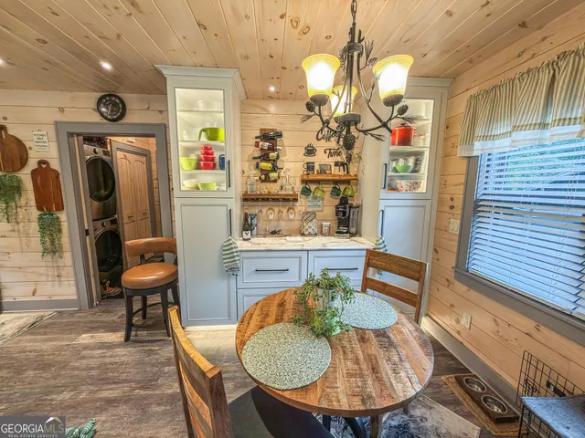 a view of a hallway with washer and dryer