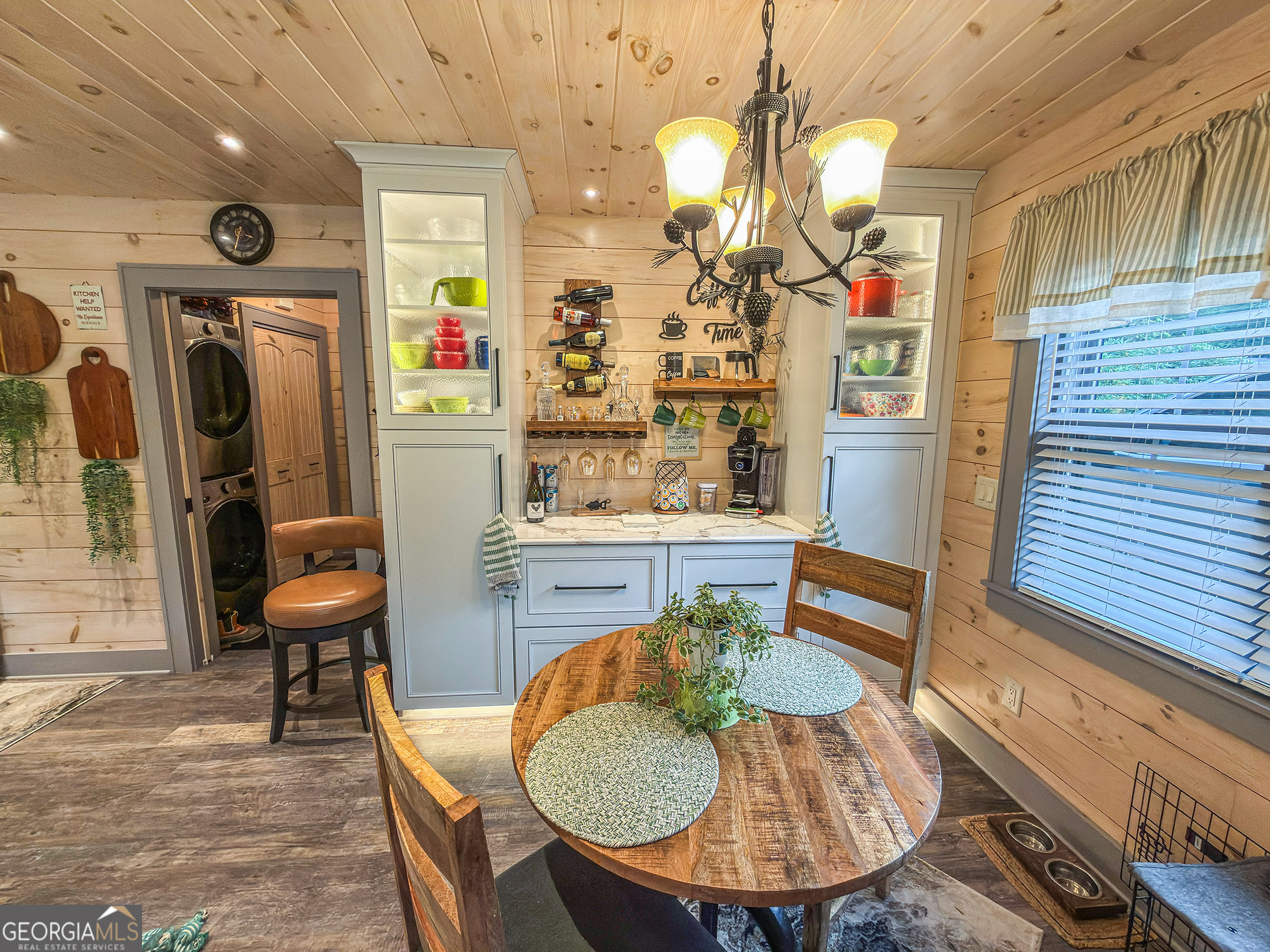 111 Wildflower Road Scaly Mountain, NC 28775 - Photo 28 of 52 a room with furniture and wooden floor