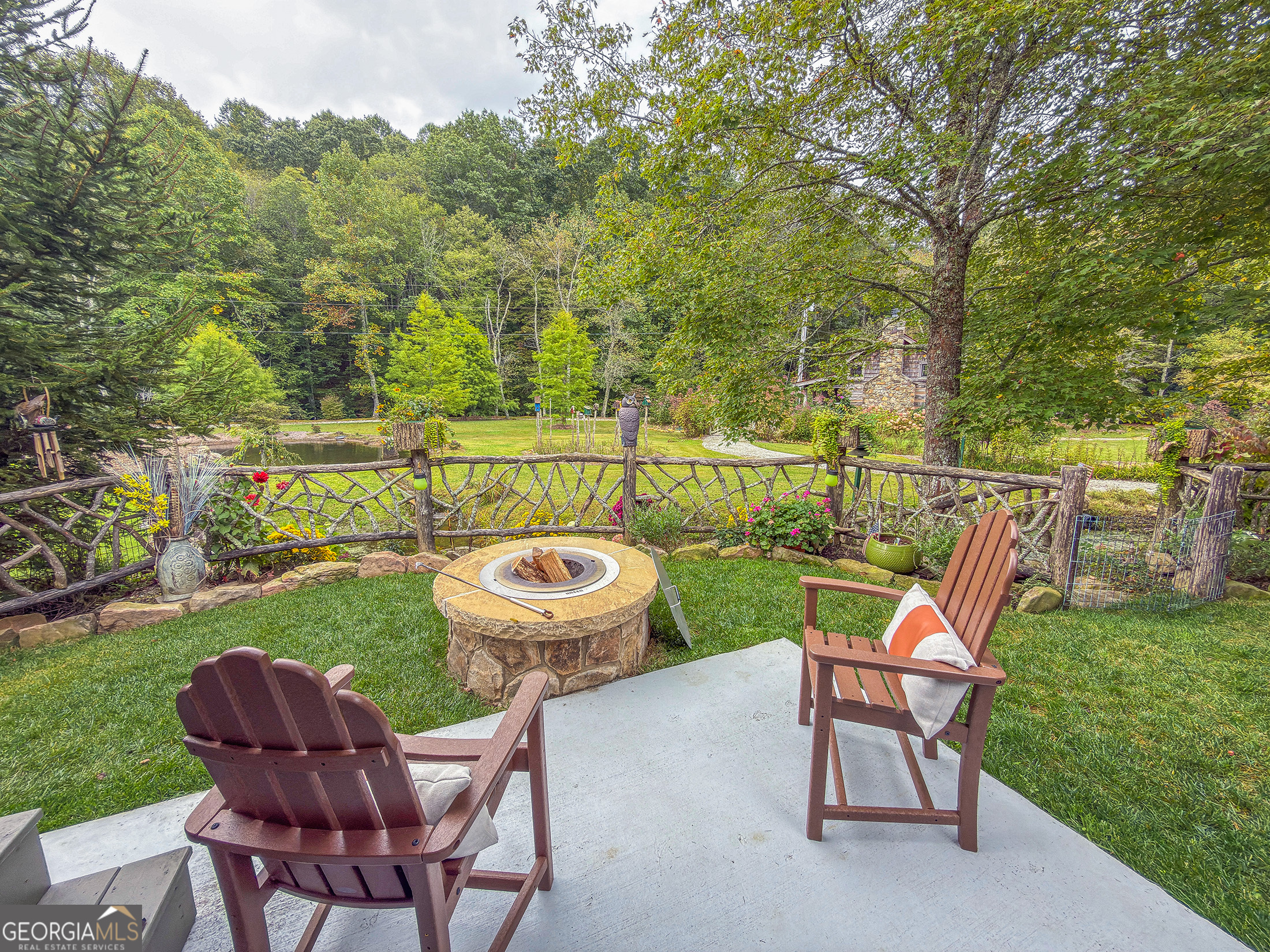 111 Wildflower Road Scaly Mountain, NC 28775 - Photo 3 of 52 a view of an outdoor sitting space
