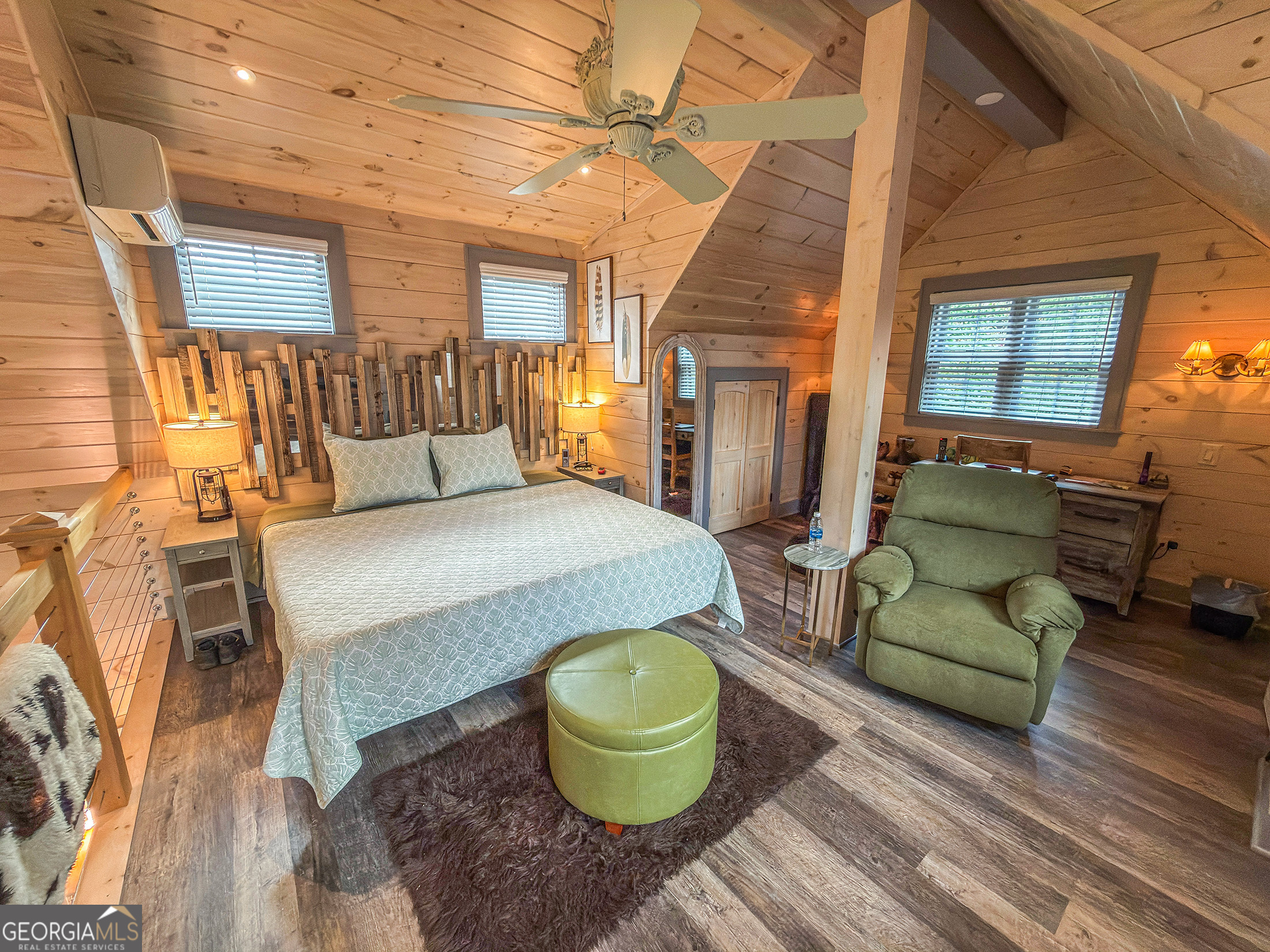 111 Wildflower Road Scaly Mountain, NC 28775 - Photo 35 of 52 a living room with furniture a window and a couch