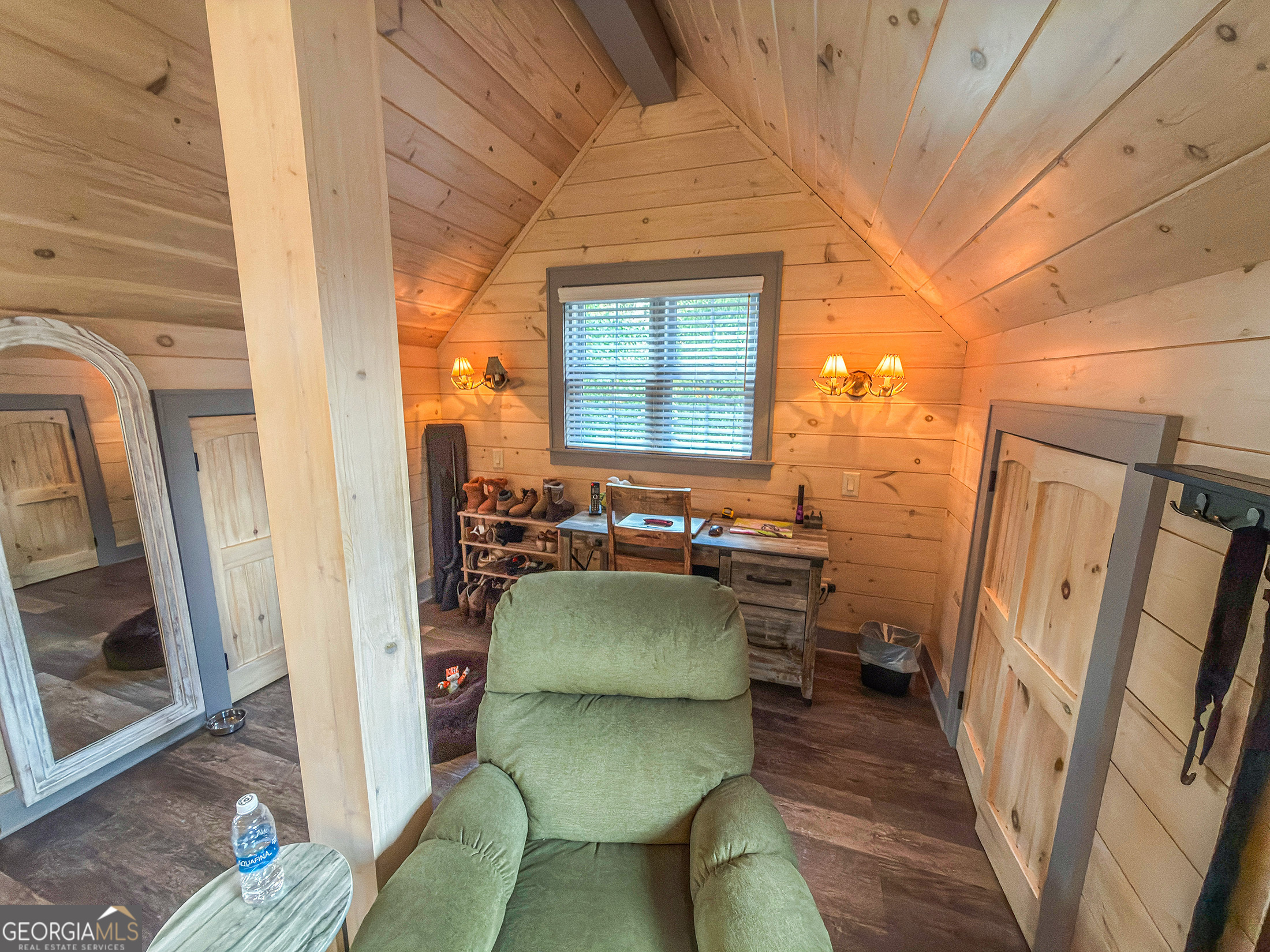 111 Wildflower Road Scaly Mountain, NC 28775 - Photo 36 of 52 a living room with furniture and a window