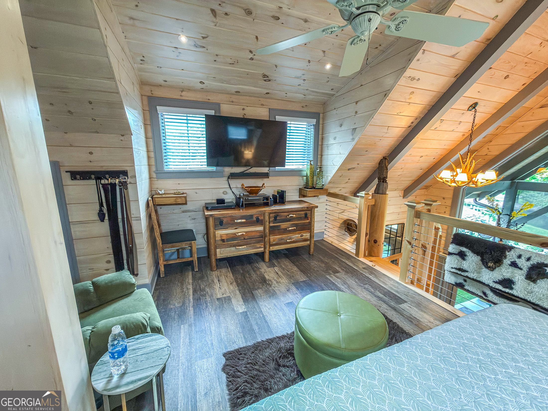 111 Wildflower Road Scaly Mountain, NC 28775 - Photo 37 of 52 a living room with furniture and a flat screen tv