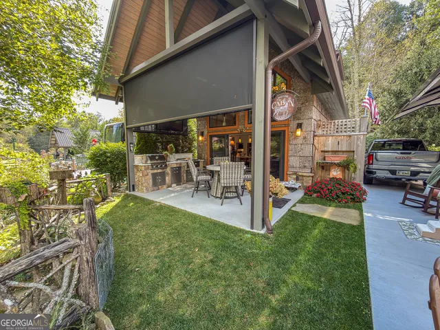a view of a patio with a yard