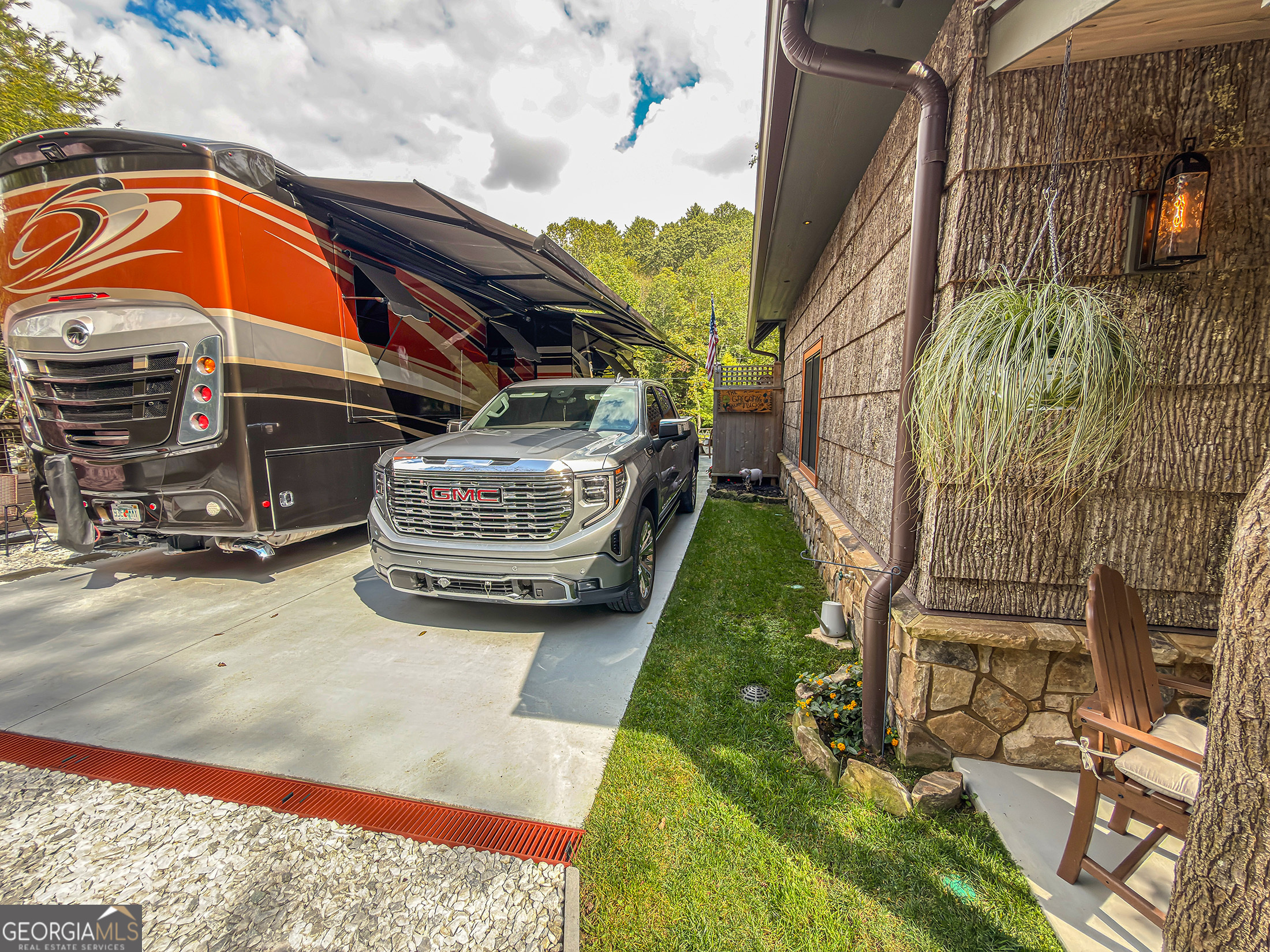 111 Wildflower Road Scaly Mountain, NC 28775 - Photo 43 of 52 a view of a two chairs in the patio