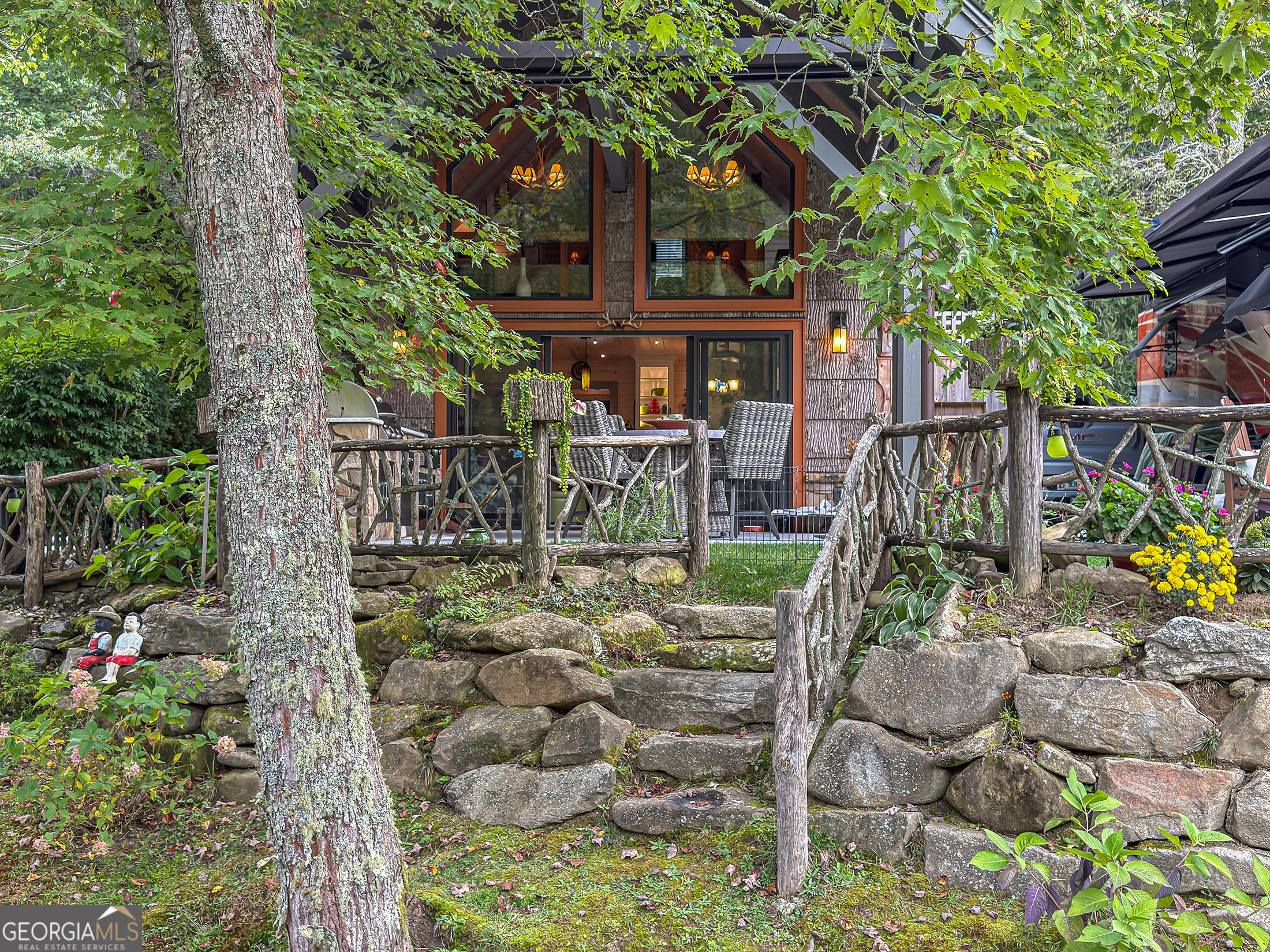 111 Wildflower Road Scaly Mountain, NC 28775 - Photo 50 of 52 a view of statue in the garden