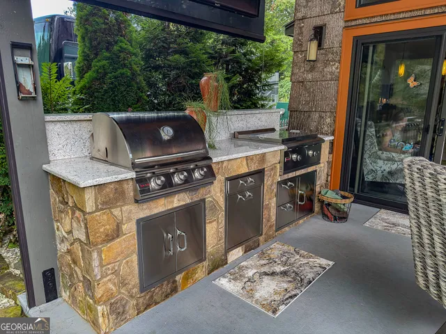 a view of outdoor kitchen outdoor space and outdoor seating