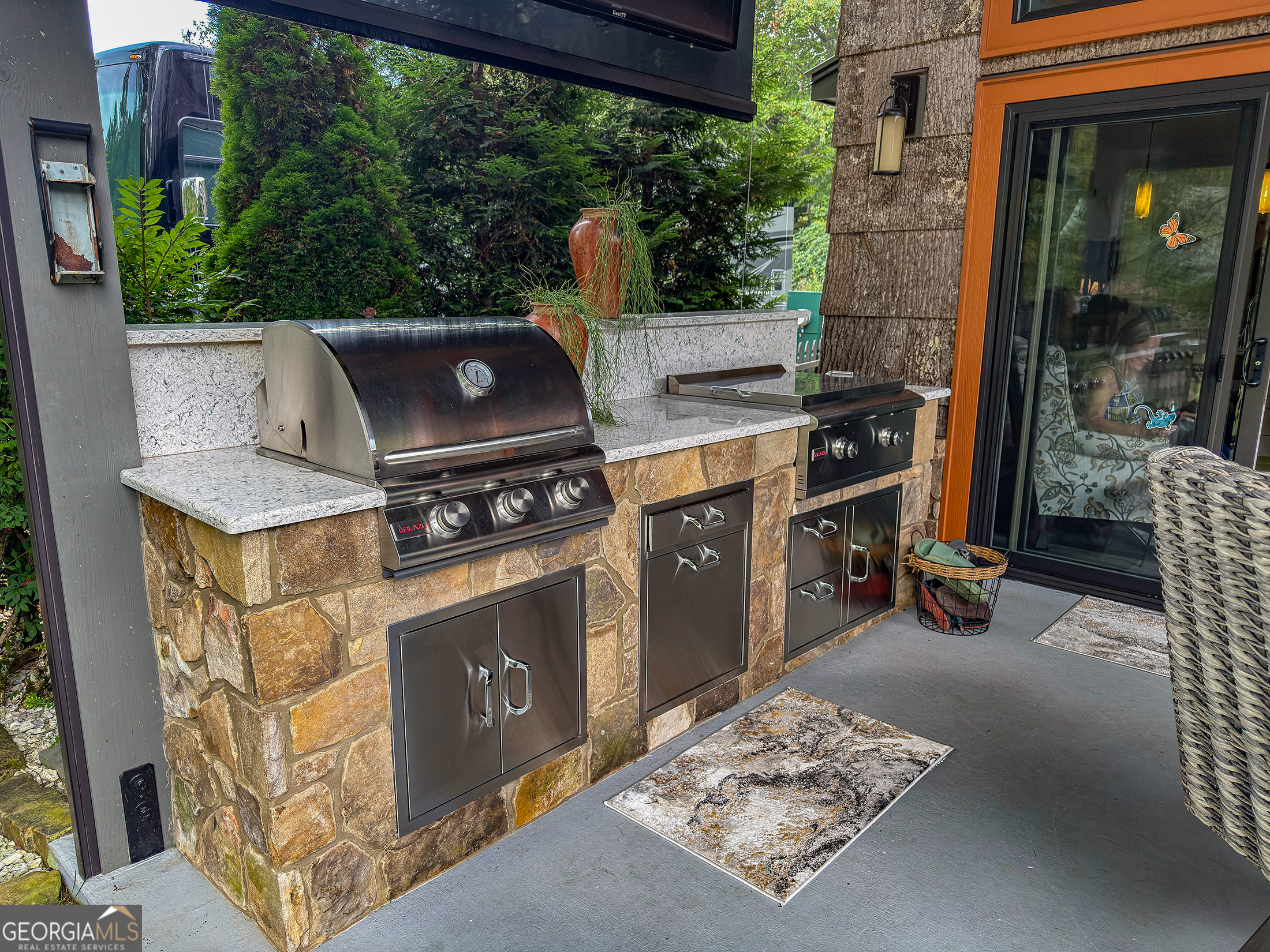 111 Wildflower Road Scaly Mountain, NC 28775 - Photo 5 of 52 a view of outdoor kitchen outdoor space and outdoor seating