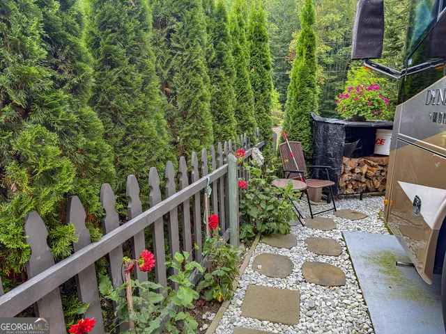 a view of a potted flower in the corridor