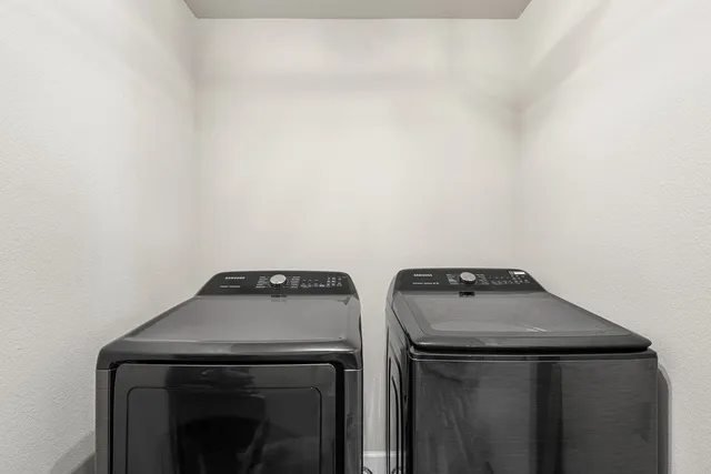 a view of backyard with seating area and green space