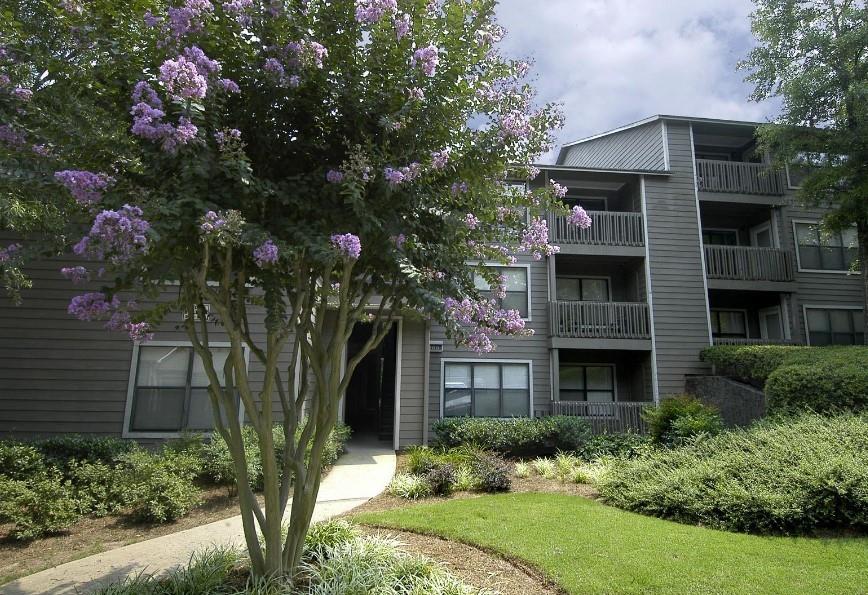 3450 K Jones Mill Road, Unit 218 Norcross, GA 30092 - Photo 17 of 29 a front view of a house with garden