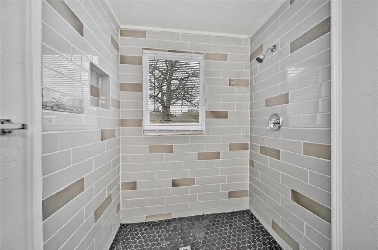 2205 Sumpter Street Houston, TX 77026 - Photo 4 of 7 a bathroom with a shower