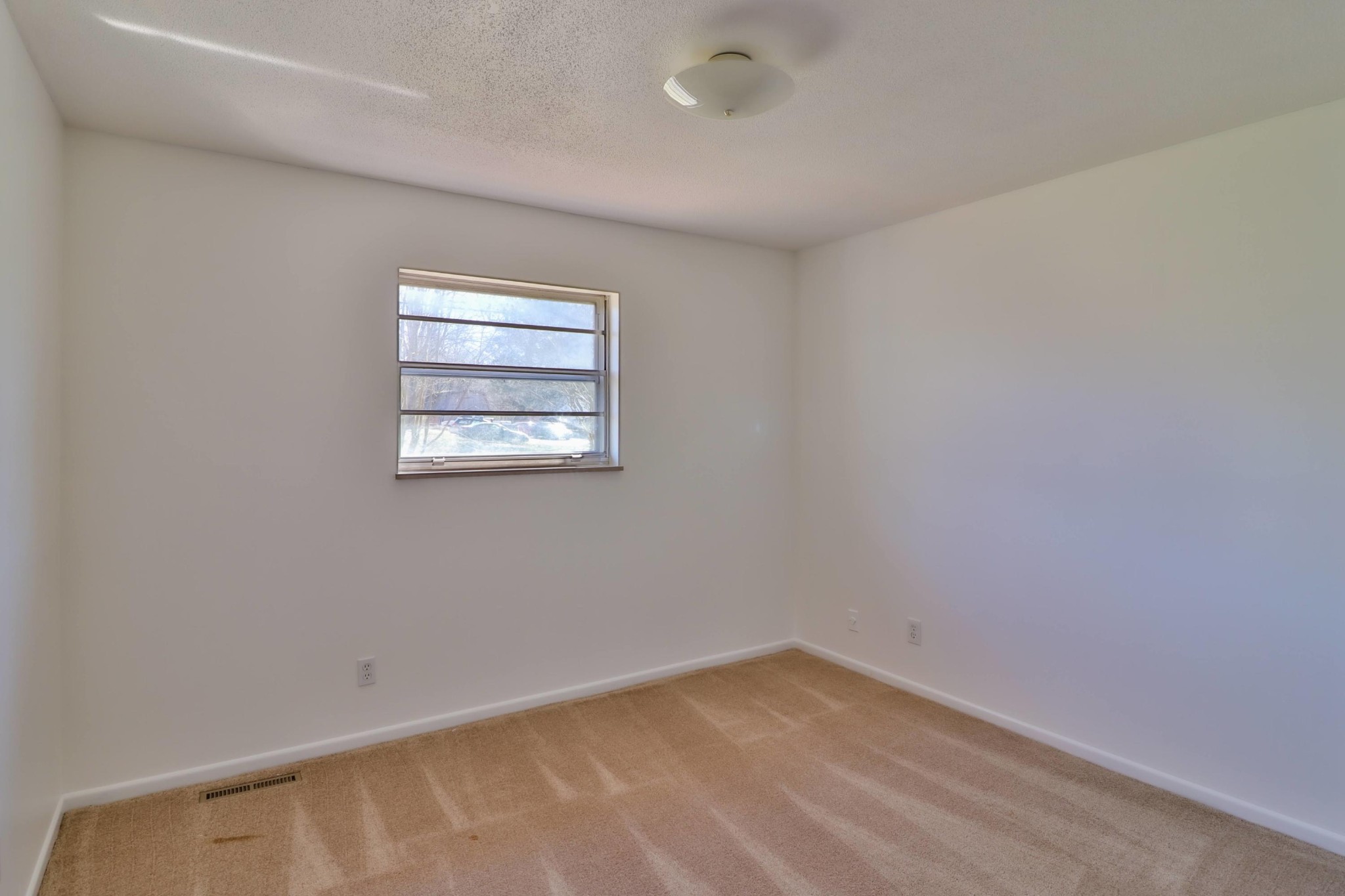 2701 Byington Beaver Ridge Road Knoxville, TN 37931 - Photo 12 of 29 an empty room with a window