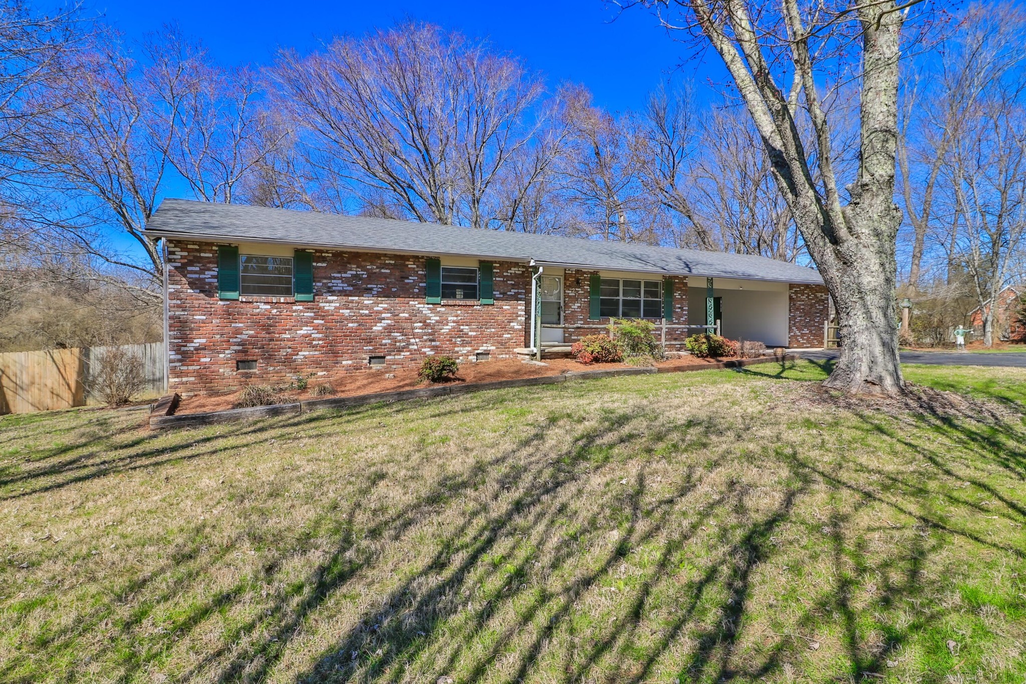 2701 Byington Beaver Ridge Road Knoxville, TN 37931 - Photo 5 of 29 a view of a house with a backyard