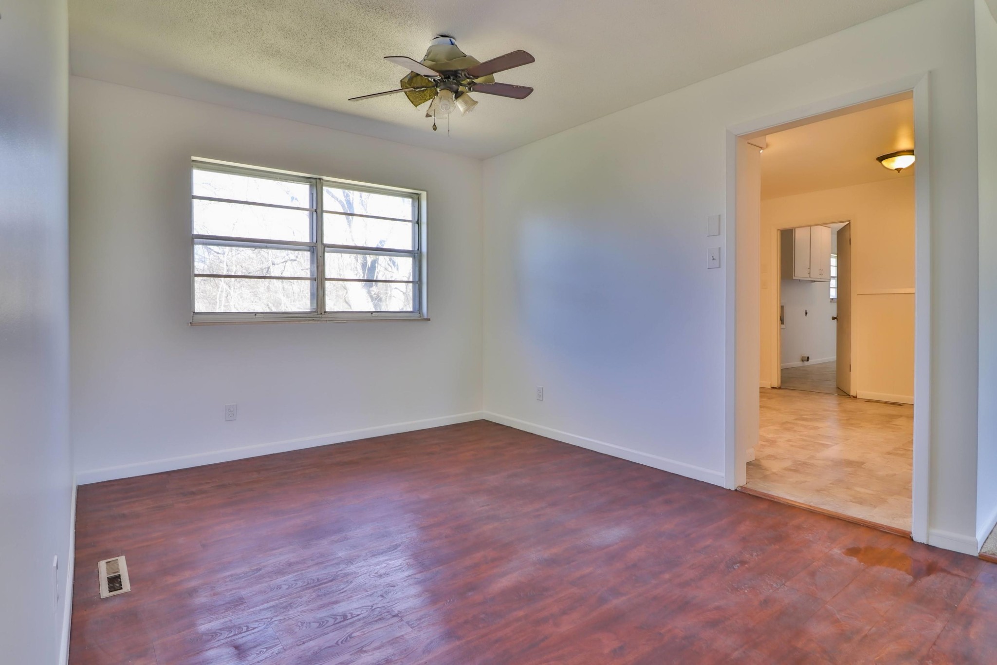 2701 Byington Beaver Ridge Road Knoxville, TN 37931 - Photo 8 of 29 wooden floor in an empty room with a window