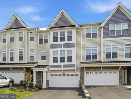 a front view of a building with glass windows