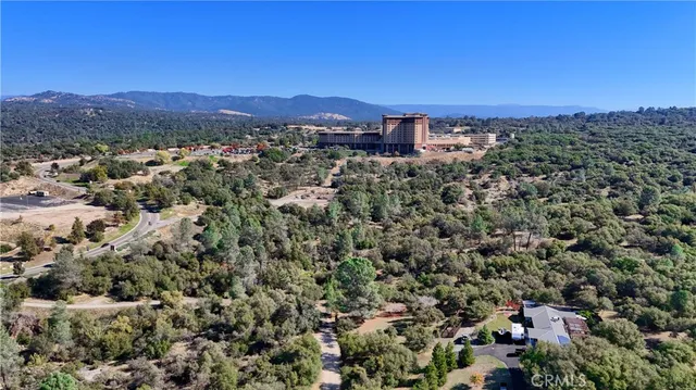 a front view of a house with yard