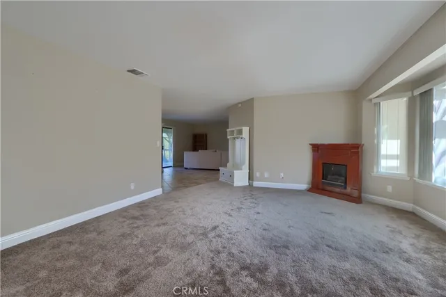 a view of a windows and chandelier in a room