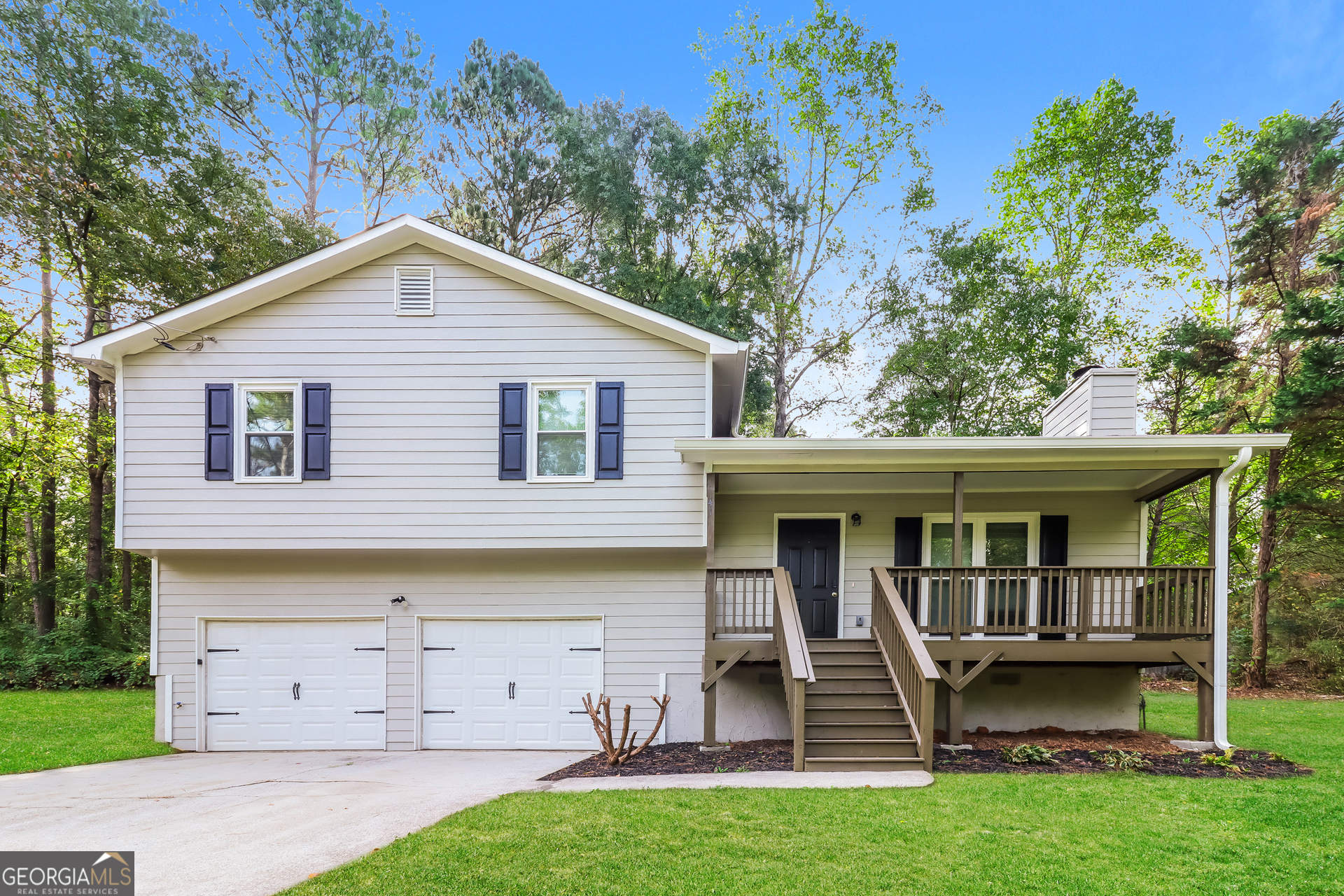 41 Valley Drive Hiram, GA 30141 - Photo 1 of 18 a view of a house with a yard and large tree