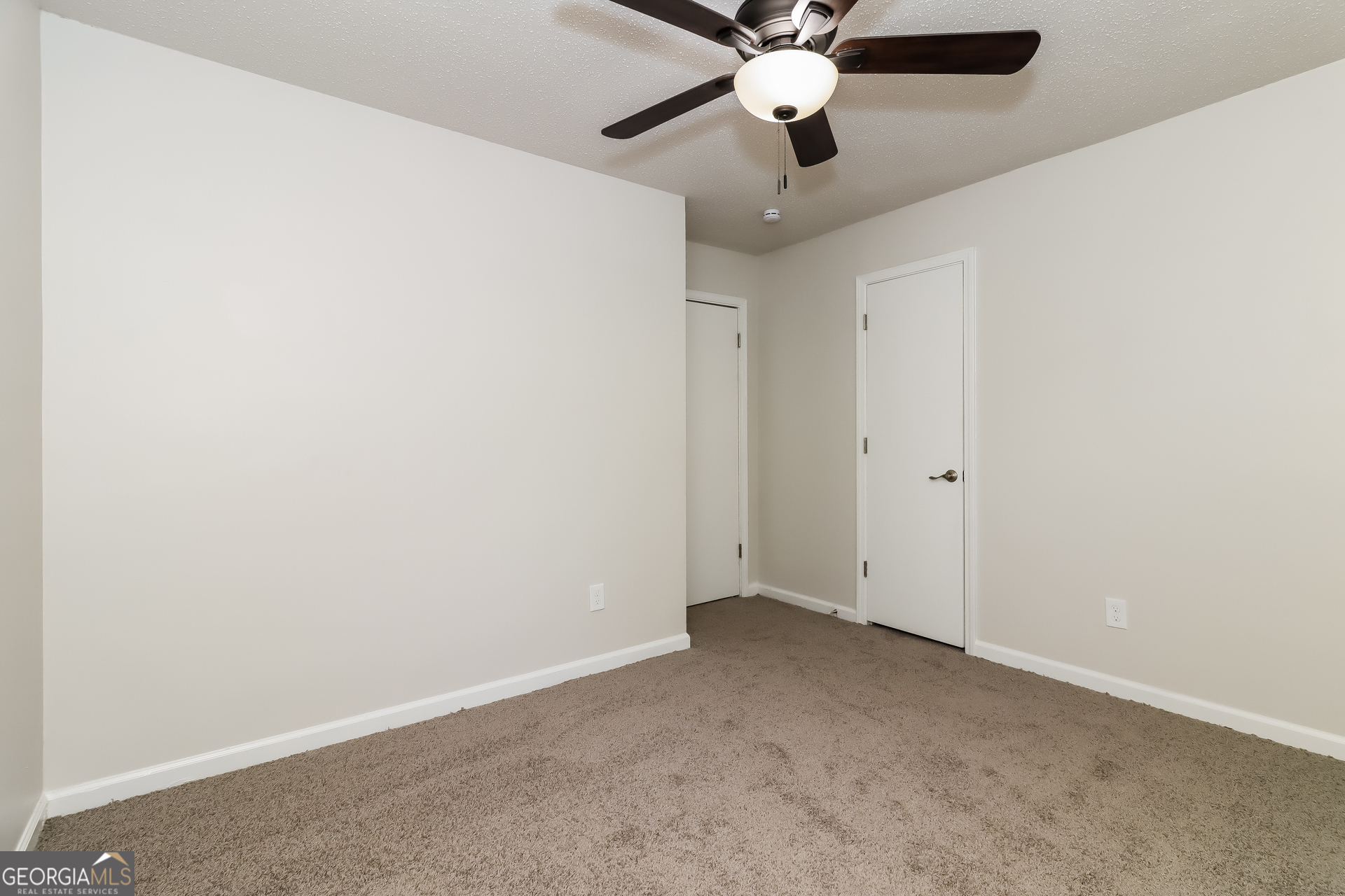 41 Valley Drive Hiram, GA 30141 - Photo 12 of 18 an empty room with a fan