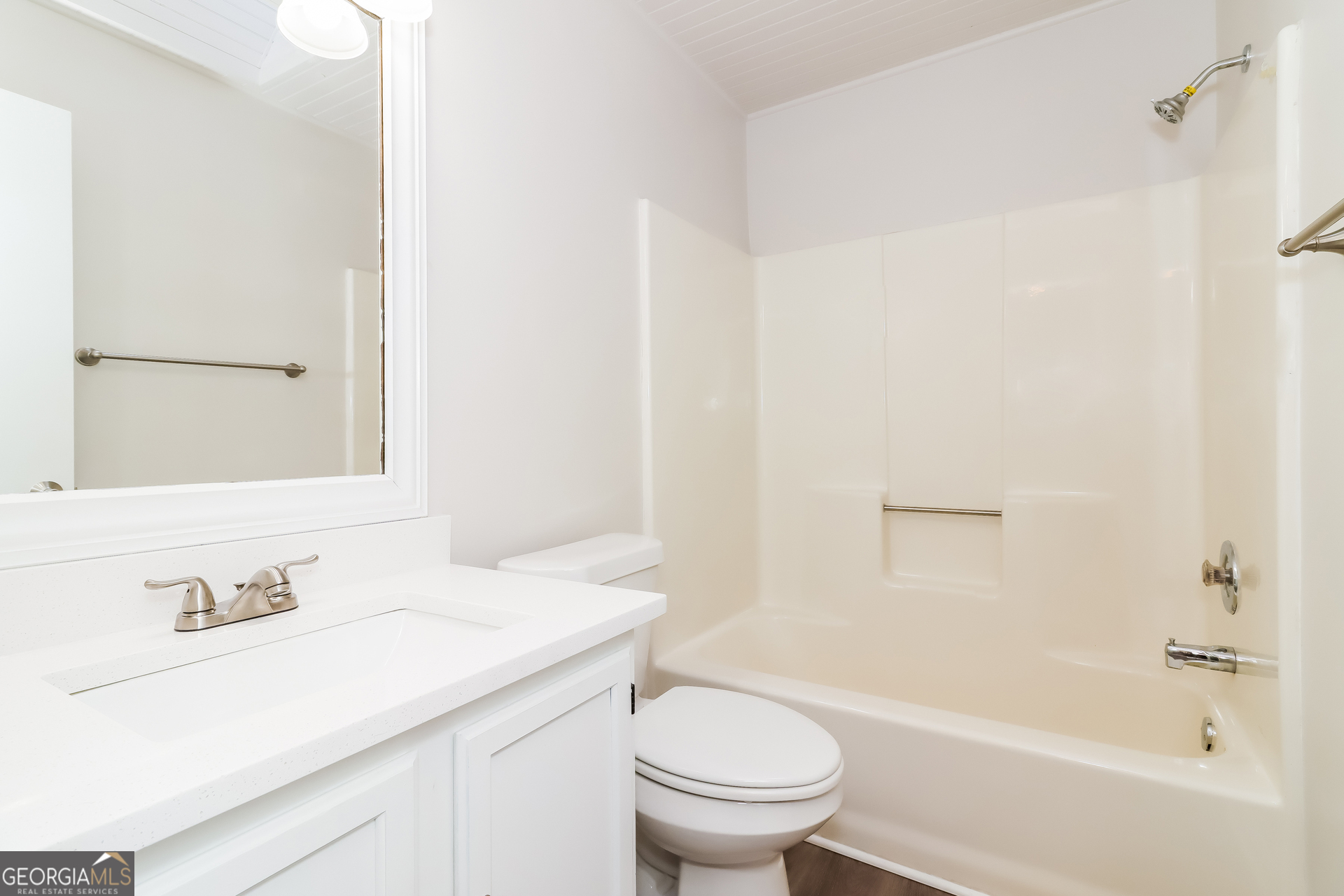 41 Valley Drive Hiram, GA 30141 - Photo 13 of 18 a bathroom with a sink toilet vanity and shower