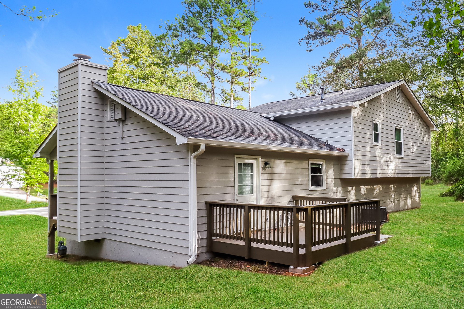 41 Valley Drive Hiram, GA 30141 - Photo 14 of 18 a front view of a house with a garden
