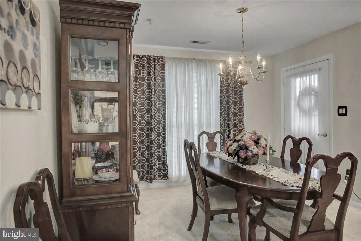 2501 Coleridge Drive, Unit 2D Frederick, MD 21702 - Photo 19 of 30 Walk from Dining to Balcony