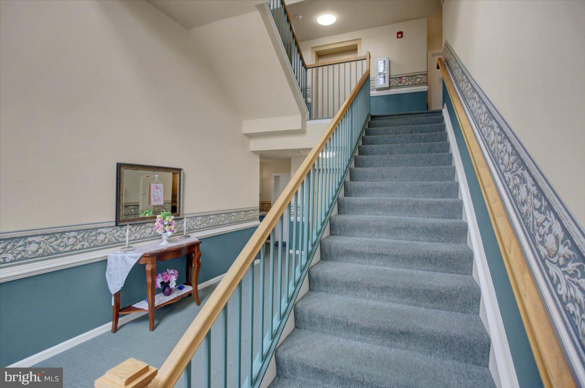 2501 Coleridge Drive, Unit 2D Frederick, MD 21702 - Photo 4 of 30 Elevator and Stairway