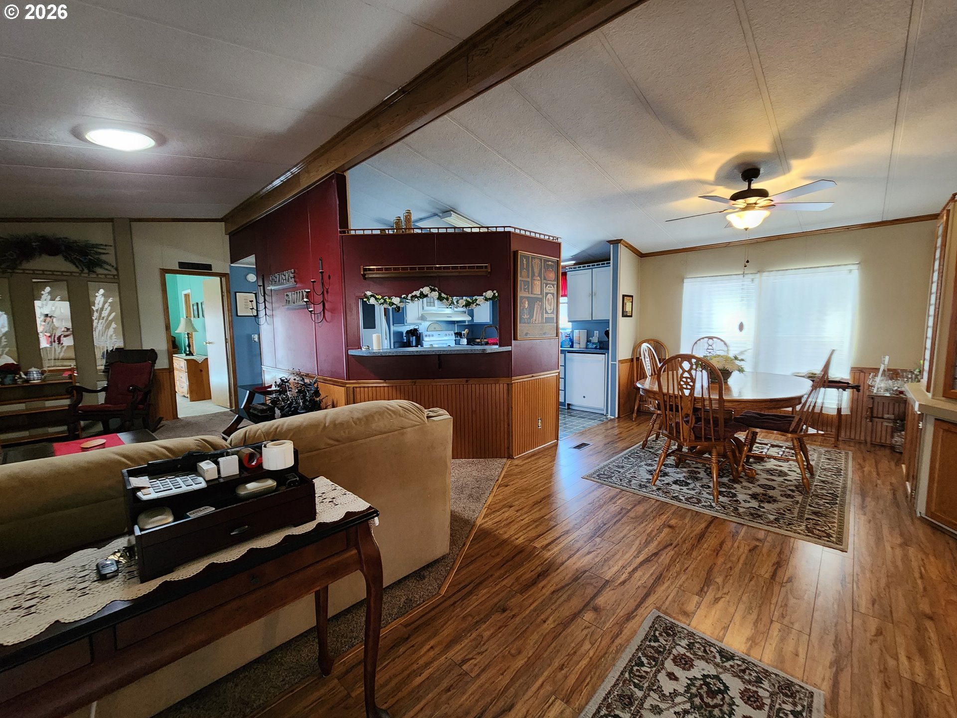 5422 Portland Road Northeast Salem, OR 97305 - Photo 3 of 14 a living room with furniture and a fireplace