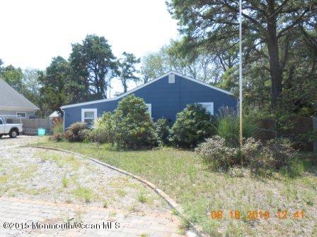 94 Club House Road Brick, NJ 08723 - Photo 1 of 4 a view of a house with a yard