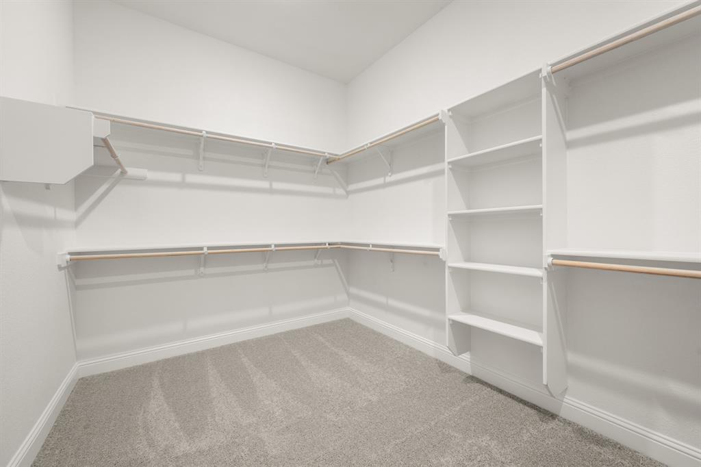764 Texas Thistle Road Waxahachie, TX 75165 - Photo 14 of 30 a view of an empty walk in closet