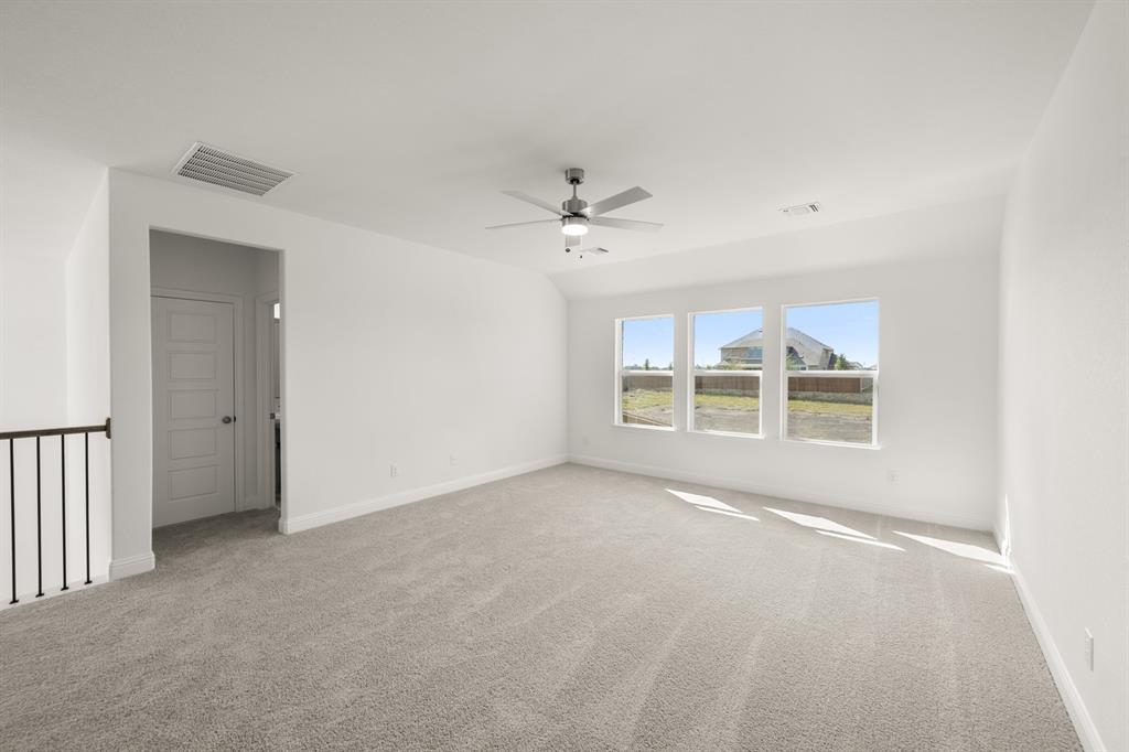 764 Texas Thistle Road Waxahachie, TX 75165 - Photo 20 of 30 a view of an empty room with a window