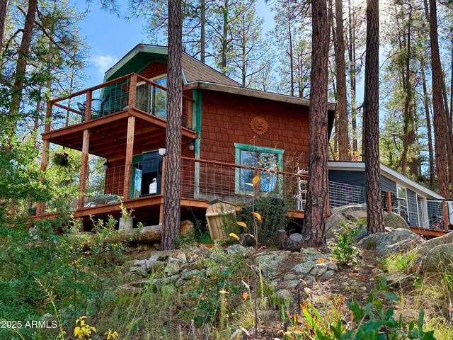 front view of a house with a small yard
