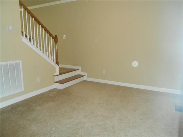 3047 Romain Trail Spring Hill, TN 37174 - Photo 12 of 19 a view of an empty room with stairs