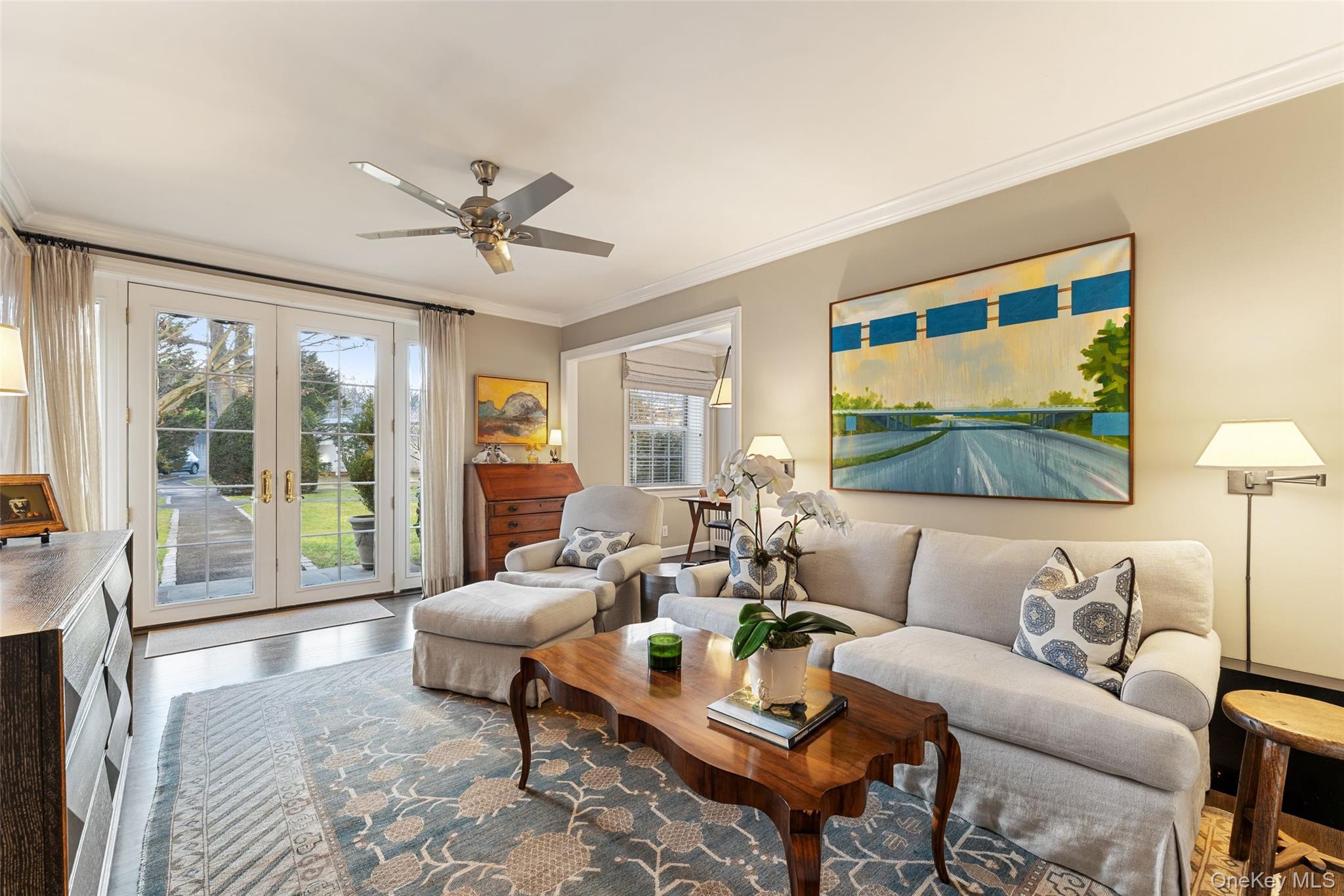 11 Brooklands, Unit GI Bronxville, NY 10708 - Photo 4 of 16 a living room with furniture and a large window