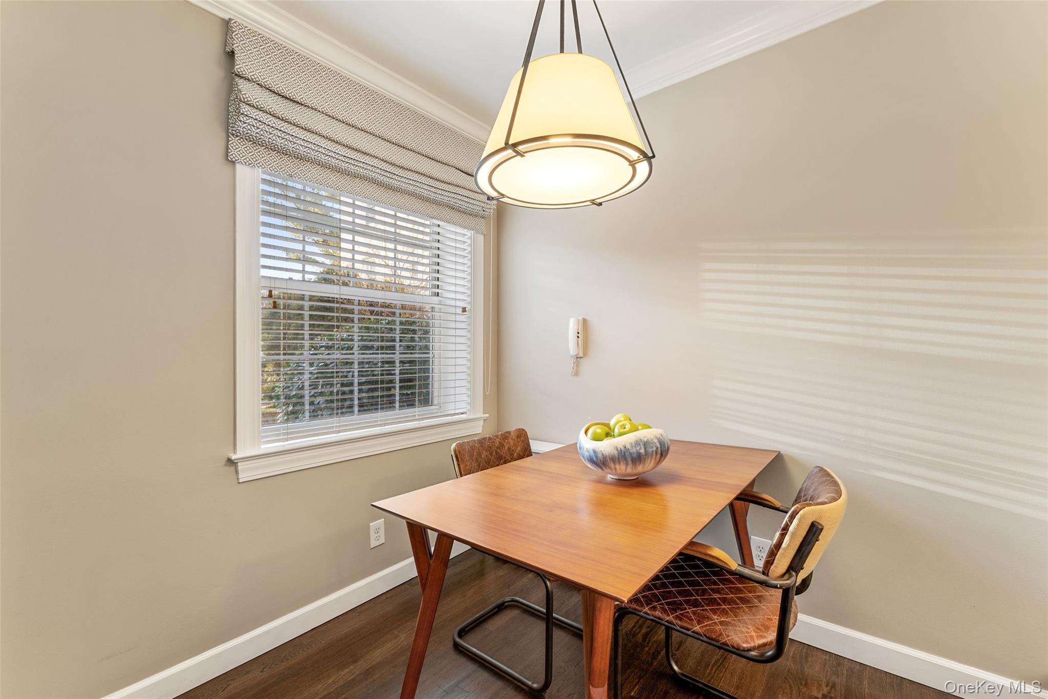 11 Brooklands, Unit GI Bronxville, NY 10708 - Photo 5 of 16 a view of a dining room with furniture and a window