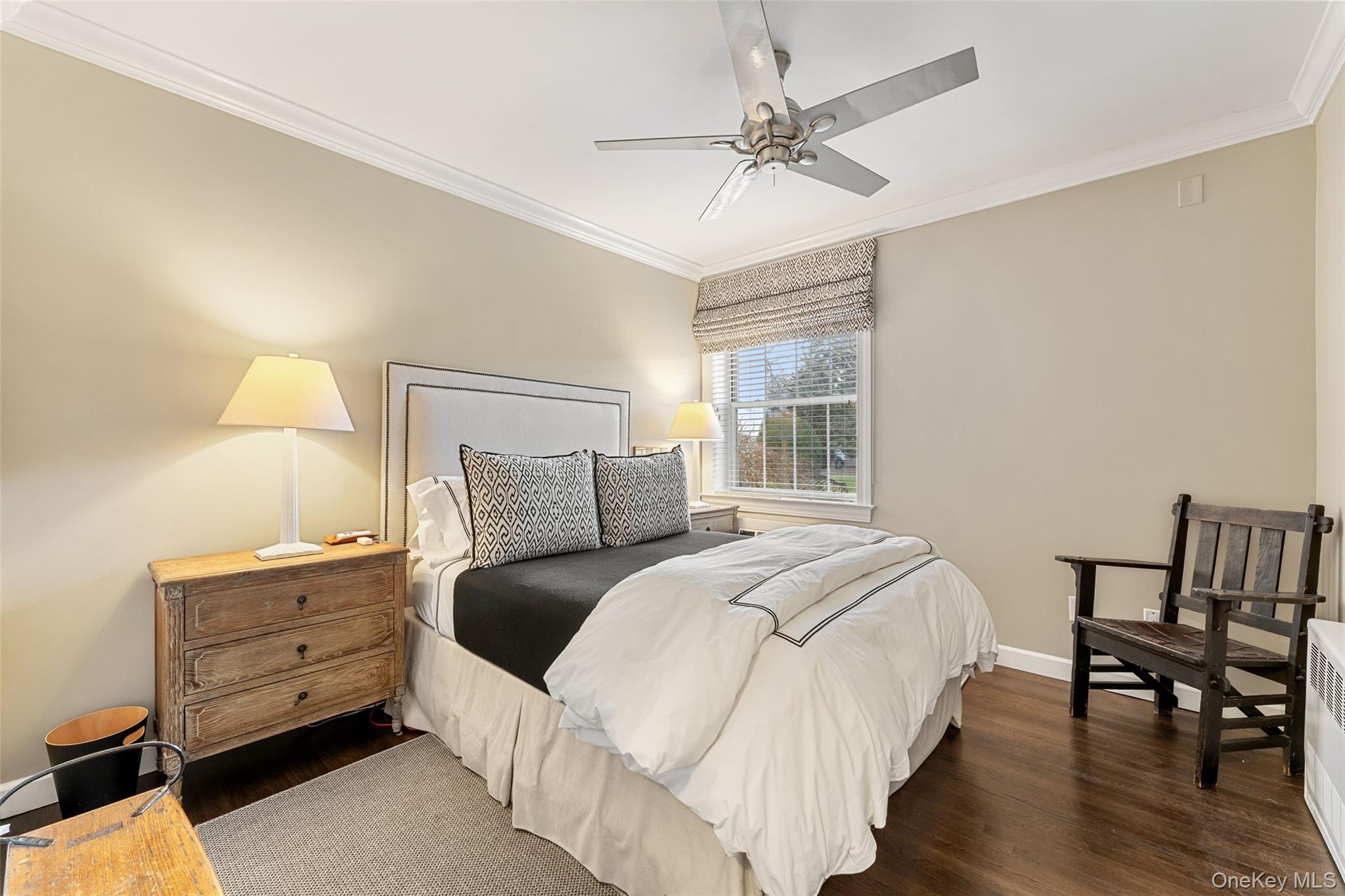 11 Brooklands, Unit GI Bronxville, NY 10708 - Photo 10 of 16 a bedroom with a bed and a table