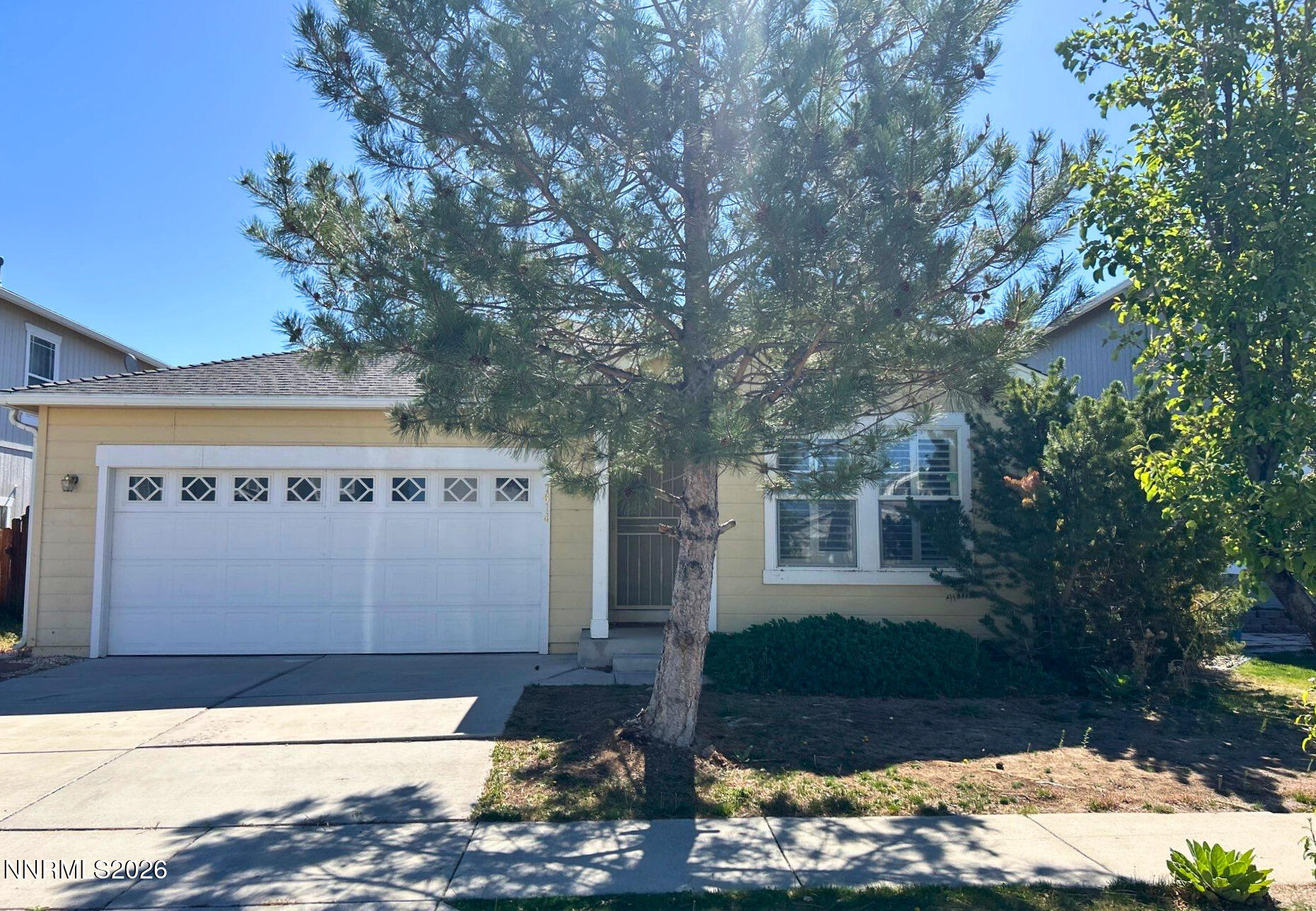 7614 Corso Street Reno, NV 89506 - Photo 1 of 15 a front view of a house