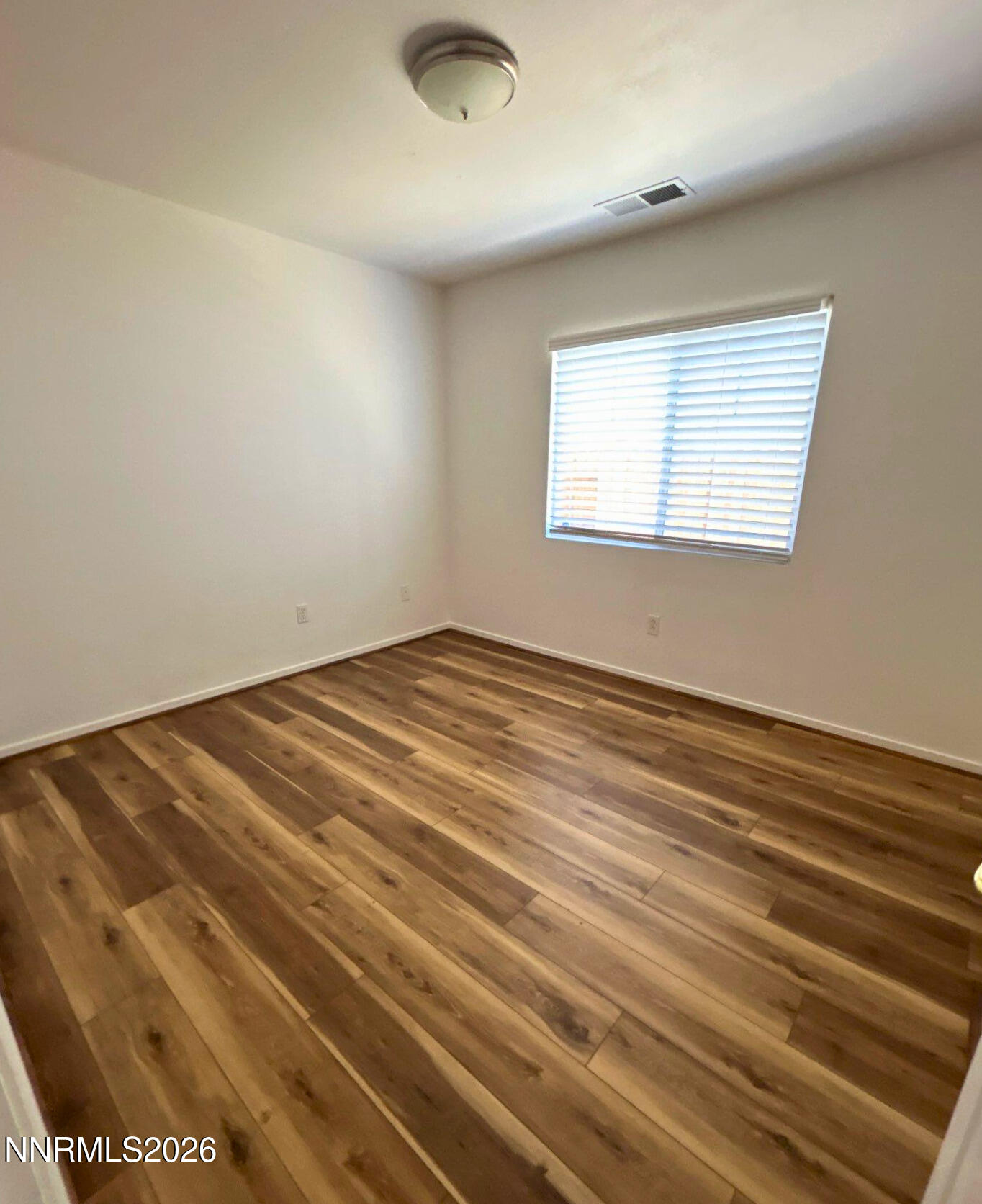 7614 Corso Street Reno, NV 89506 - Photo 12 of 15 an empty room with a window