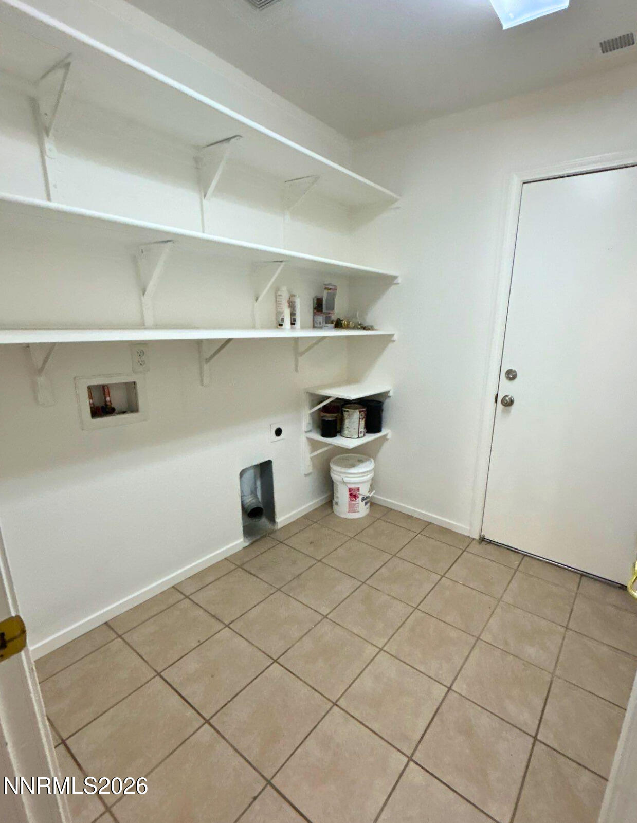 7614 Corso Street Reno, NV 89506 - Photo 14 of 15 a view of a closet with empty racks