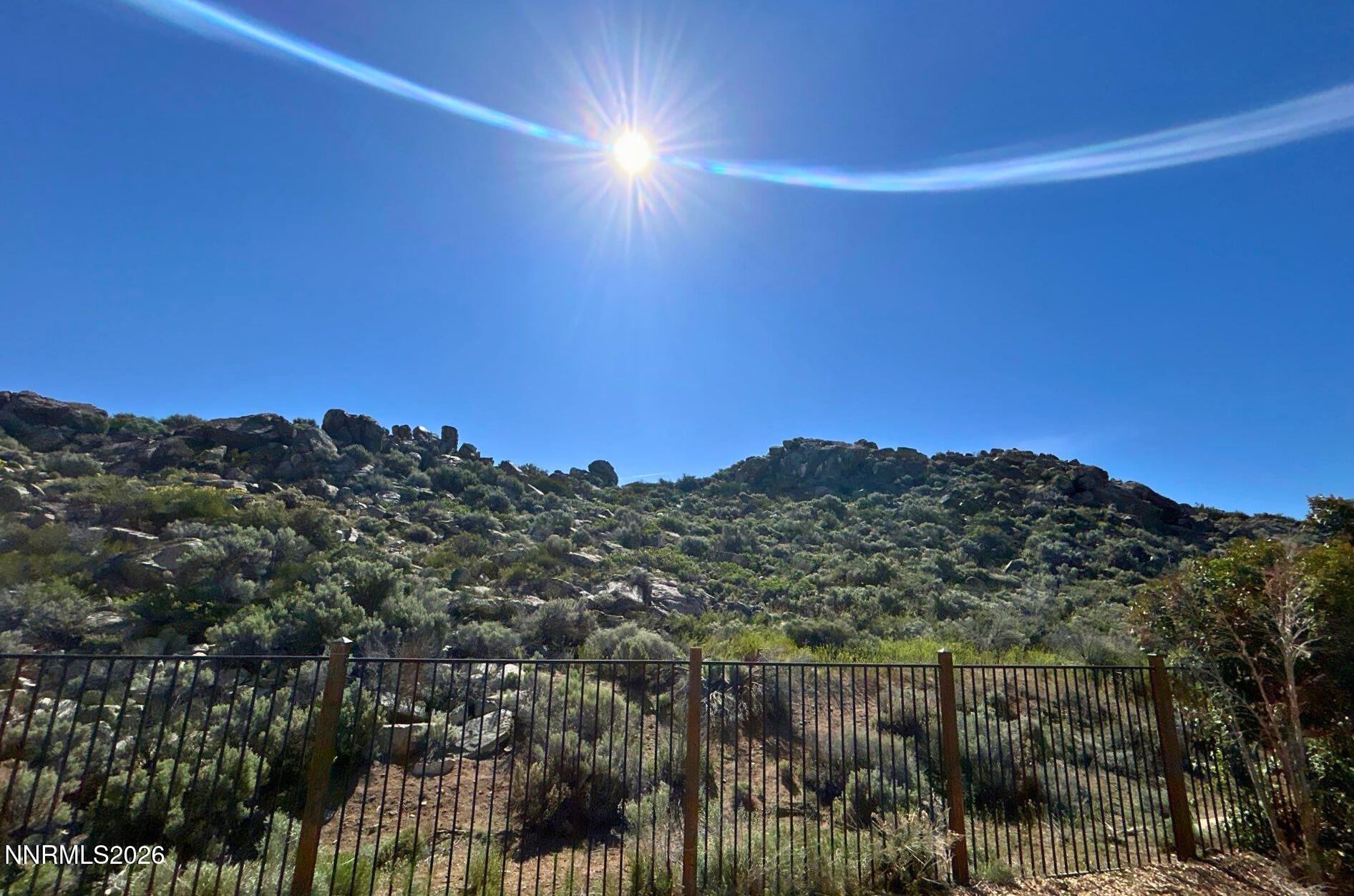 7614 Corso Street Reno, NV 89506 - Photo 15 of 15 a view of a lake and a mountain view