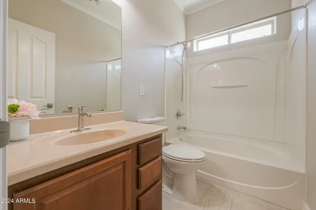 a bathroom with a sink a toilet and a bathtub