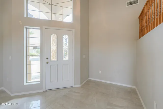 an empty room with windows