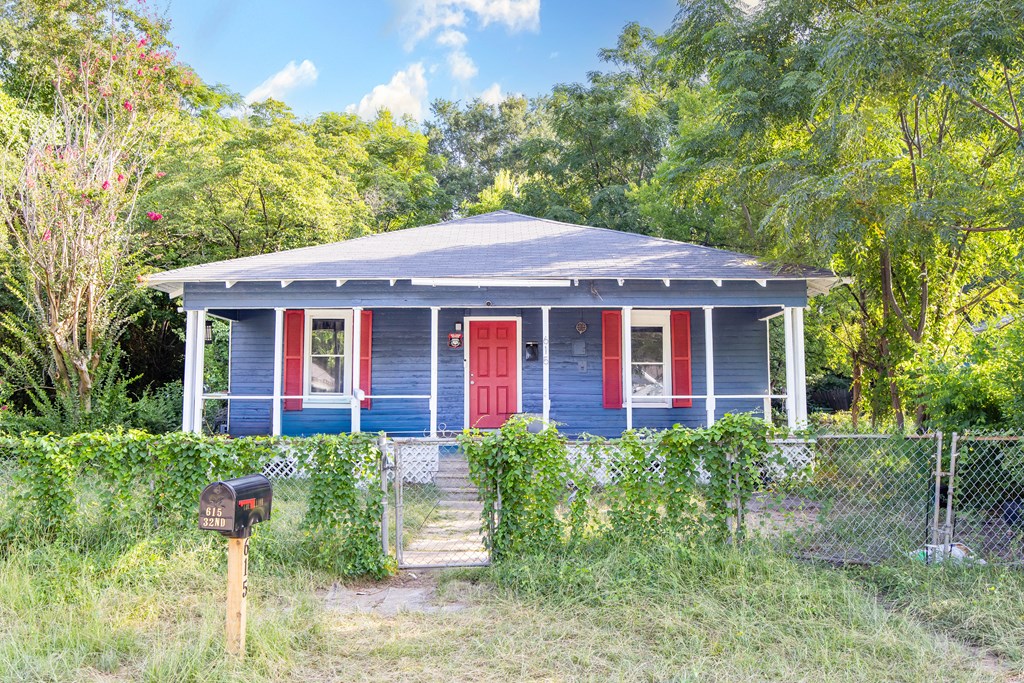108 Comer Street Columbus, GA 31904 - Photo 4 of 11 a front view of a house with a yard