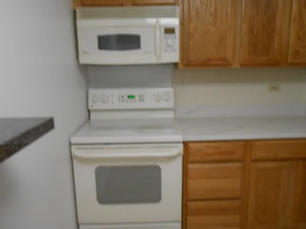 a bathroom with a sink and cabinets