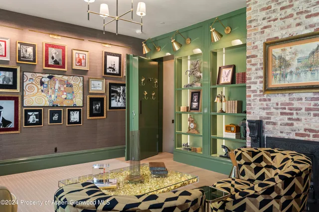 a bathroom with a granite countertop sink and a large mirror