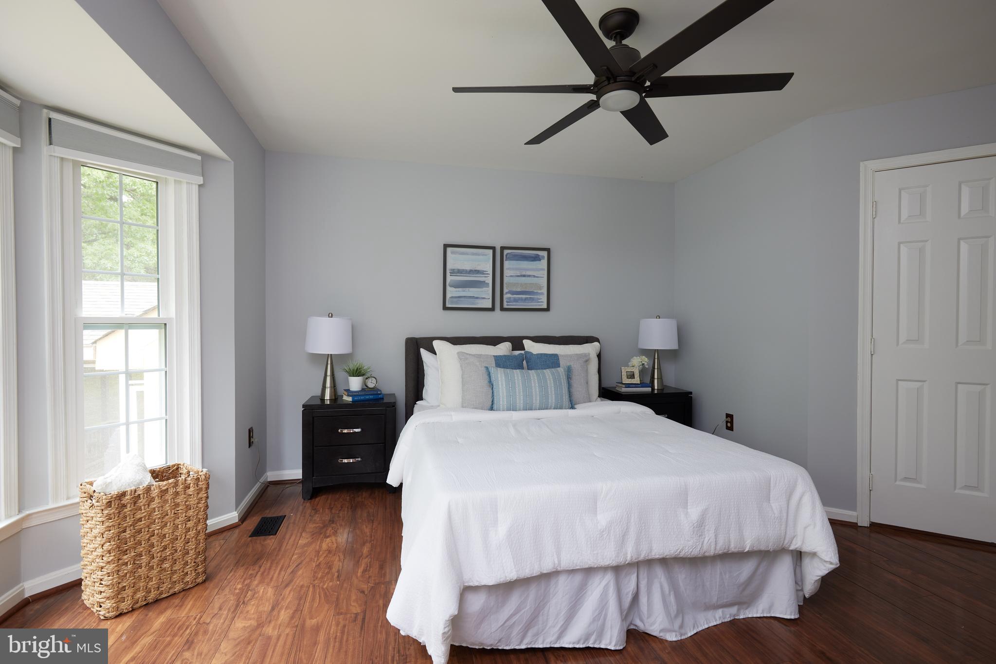 2723 Deer Ridge Drive Silver Spring, MD 20904 - Photo 25 of 45 a bedroom with a bed and window